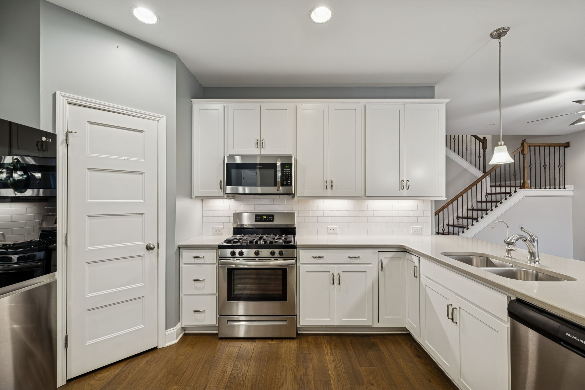 352 Buckner Cir Mount Mount Juliet, TN 37122 - Photo 21 of 51 a kitchen with white cabinets and appliances