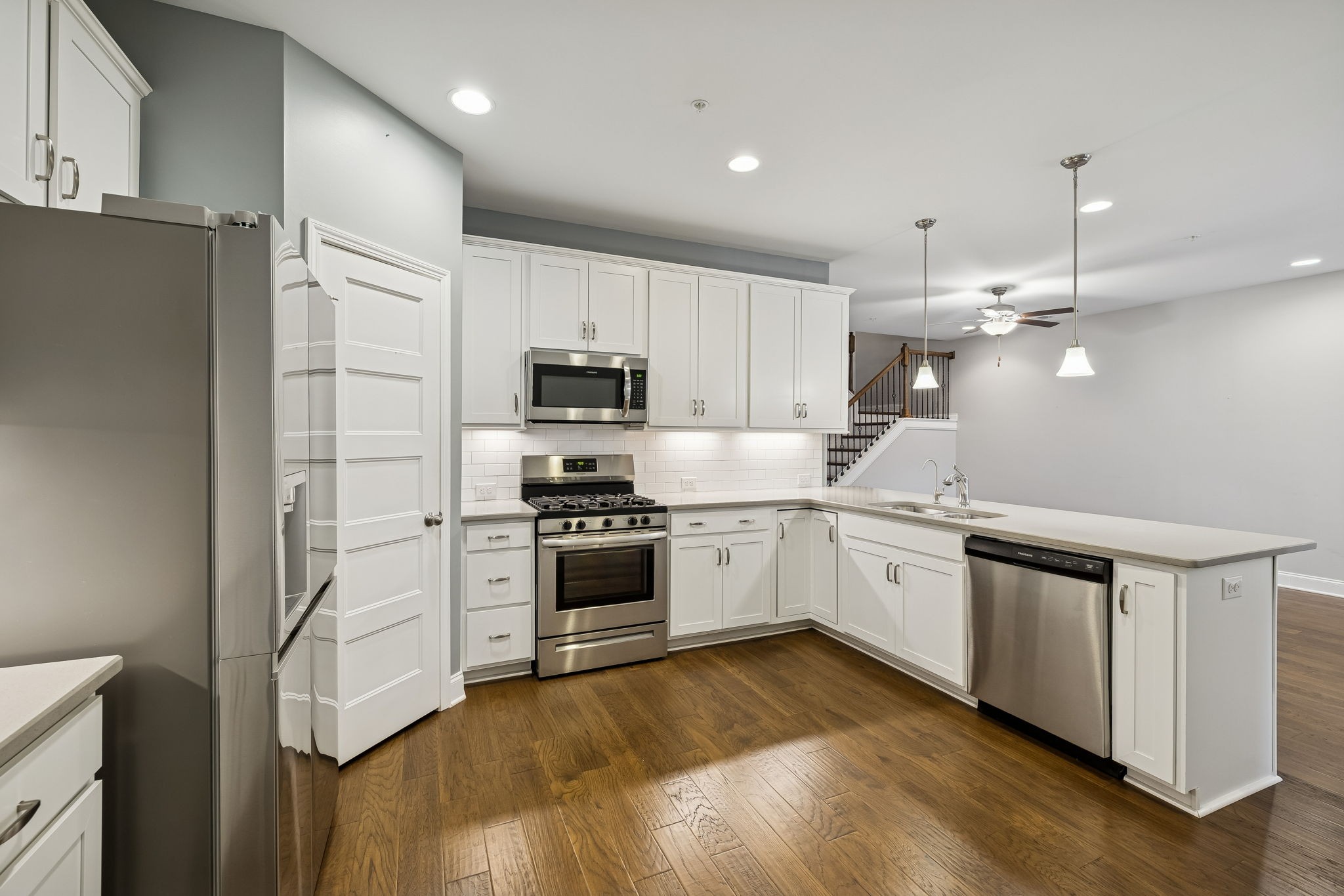 352 Buckner Cir Mount Mount Juliet, TN 37122 - Photo 23 of 51 a kitchen with kitchen island granite countertop a sink cabinets and stainless steel appliances