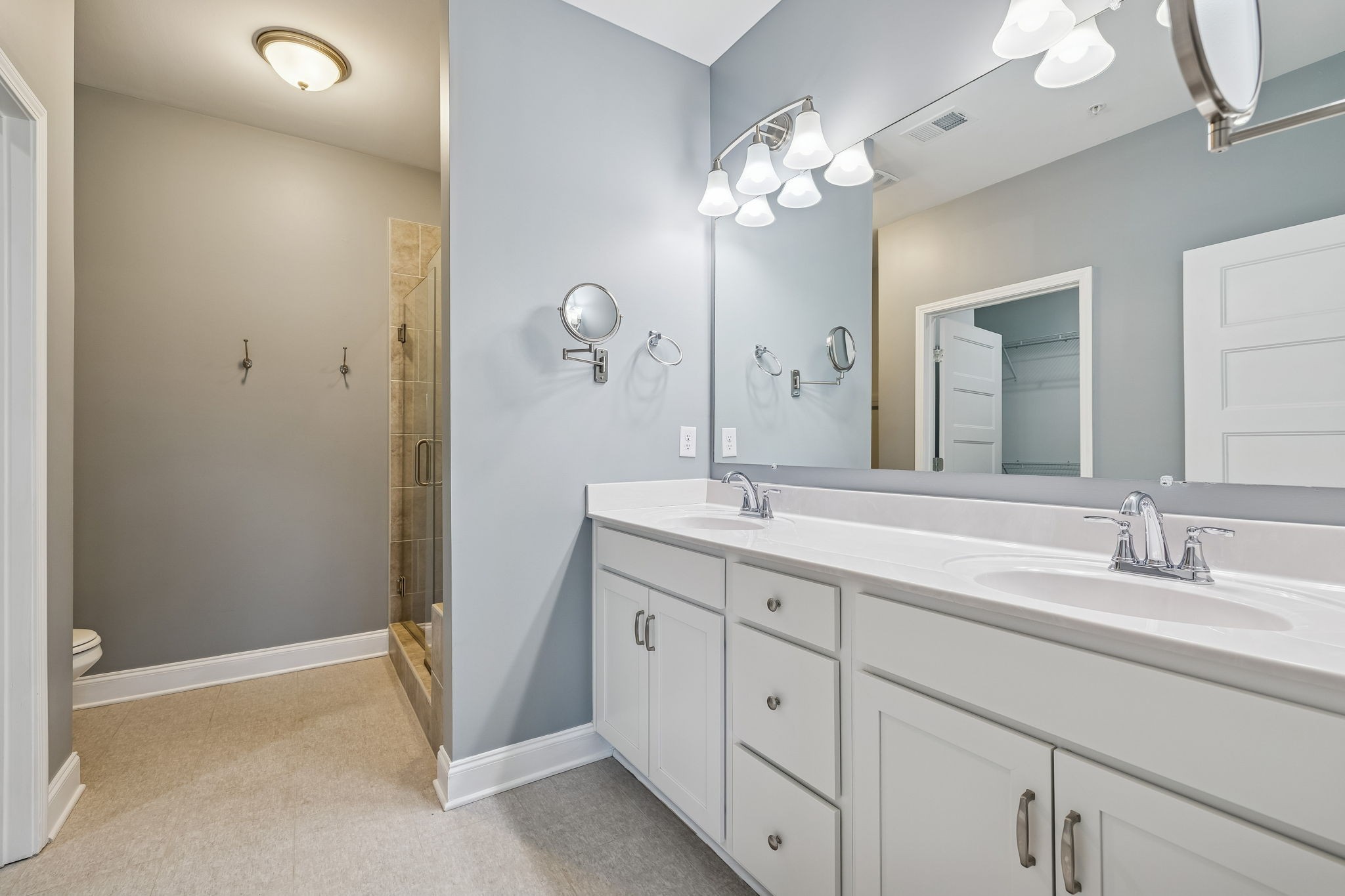 352 Buckner Cir Mount Mount Juliet, TN 37122 - Photo 30 of 51 a spacious bathroom with a double vanity sink mirror and