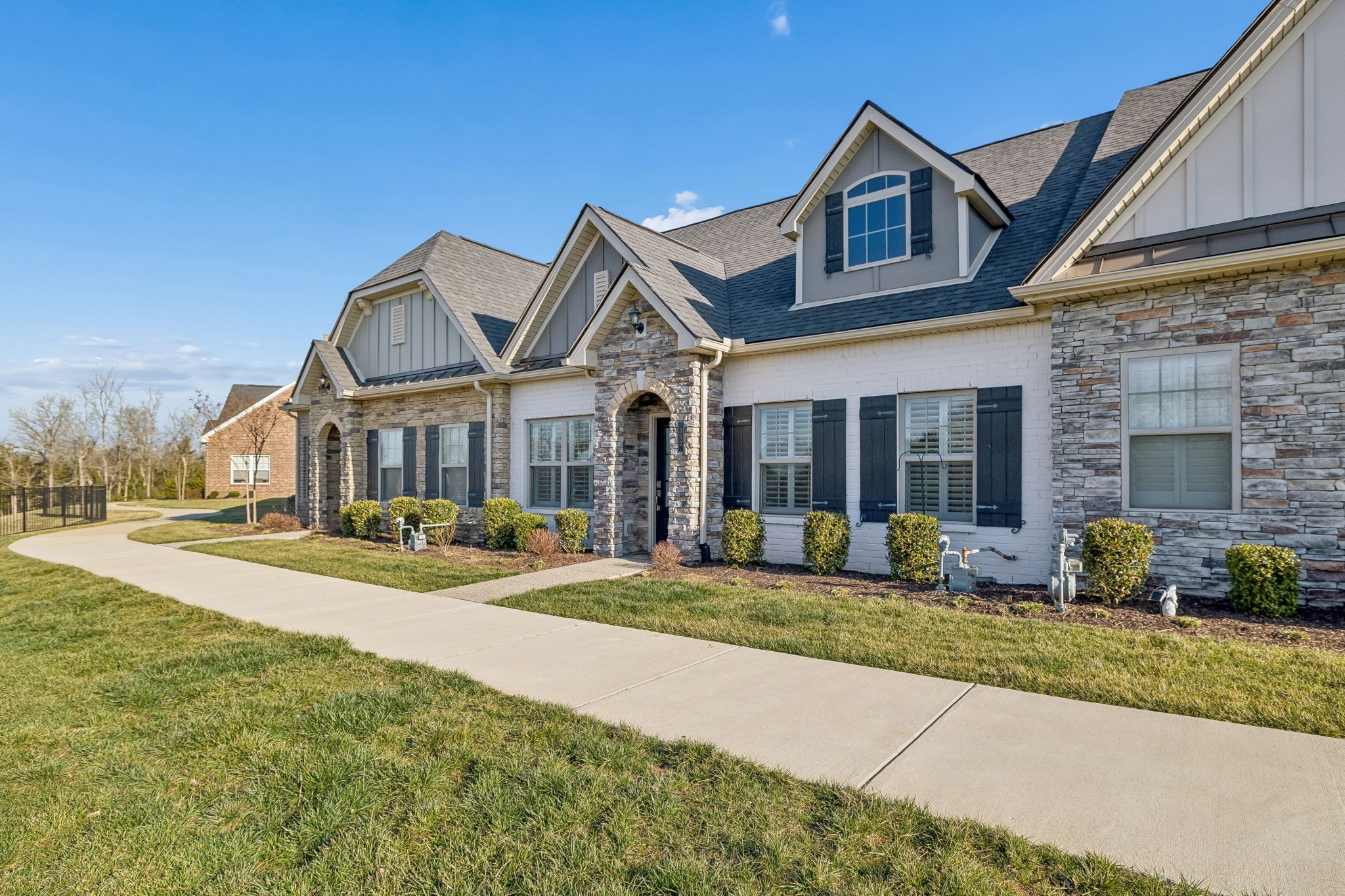 352 Buckner Cir Mount Mount Juliet, TN 37122 - Photo 4 of 51 a front view of a house with a yard and outdoor seating