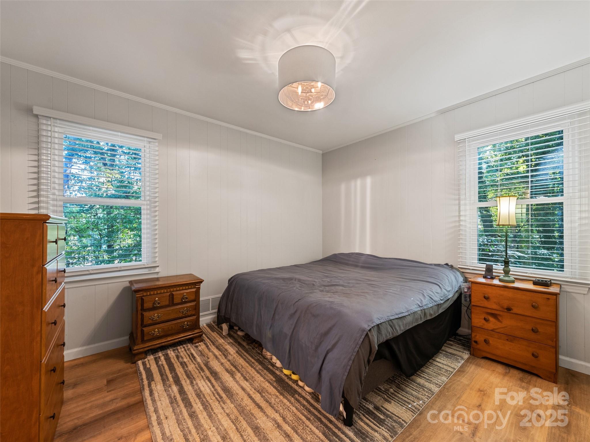 263 Blanton Street Columbus, NC 28722 - Photo 20 of 45 a bed room with a bed and a window