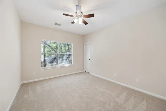 a bathroom with a sink a mirror a bathtub and shower