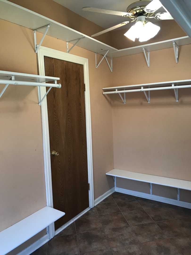 3246 West 65th Street Chicago, IL 60629 - Photo 17 of 50 a view of an empty room with a mirror