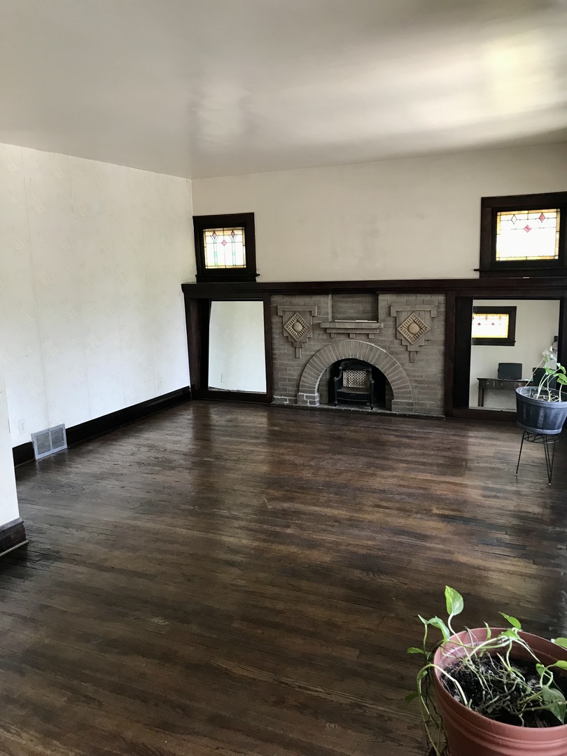 3246 West 65th Street Chicago, IL 60629 - Photo 6 of 50 a view of a room with wooden floor