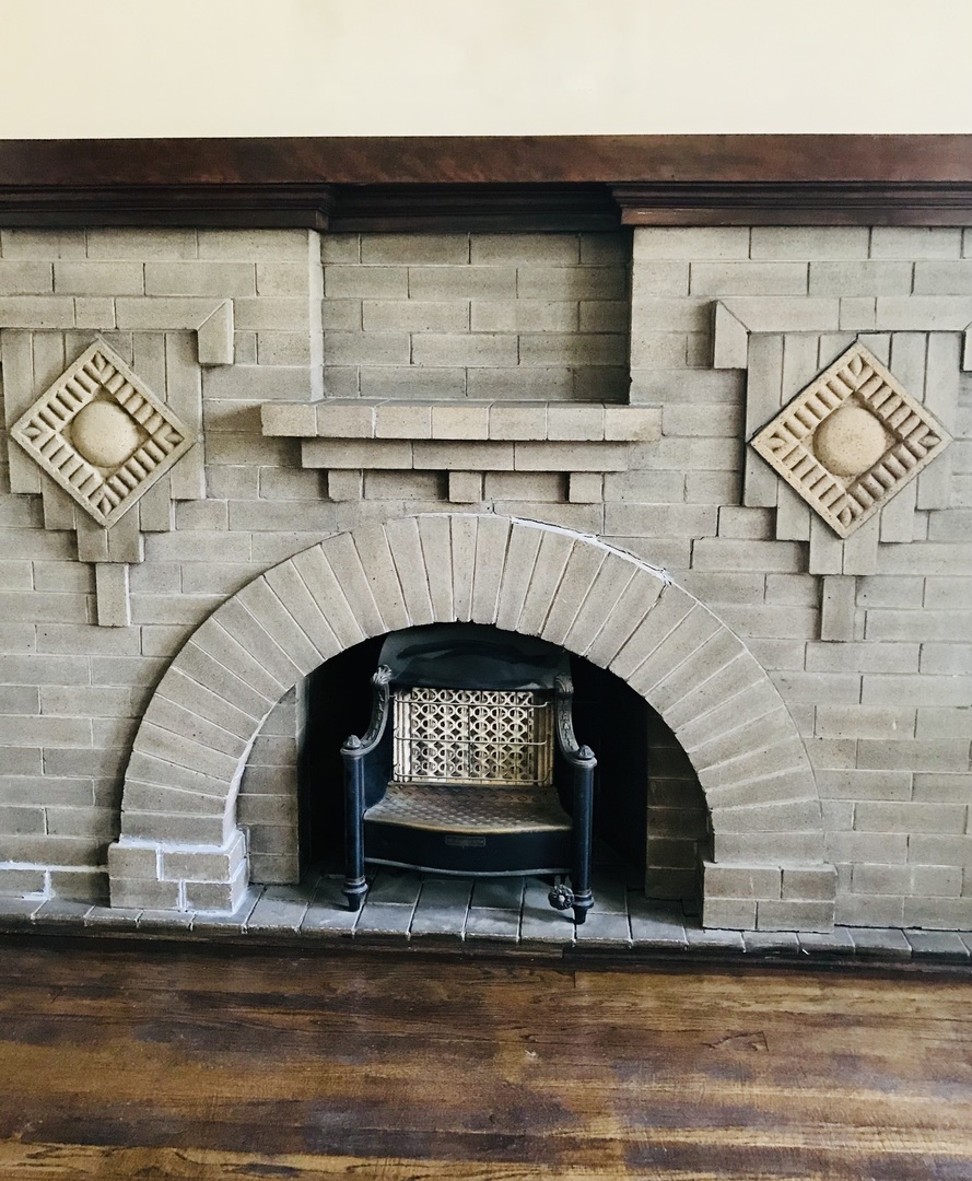 3246 West 65th Street Chicago, IL 60629 - Photo 7 of 50 a living room with a fireplace
