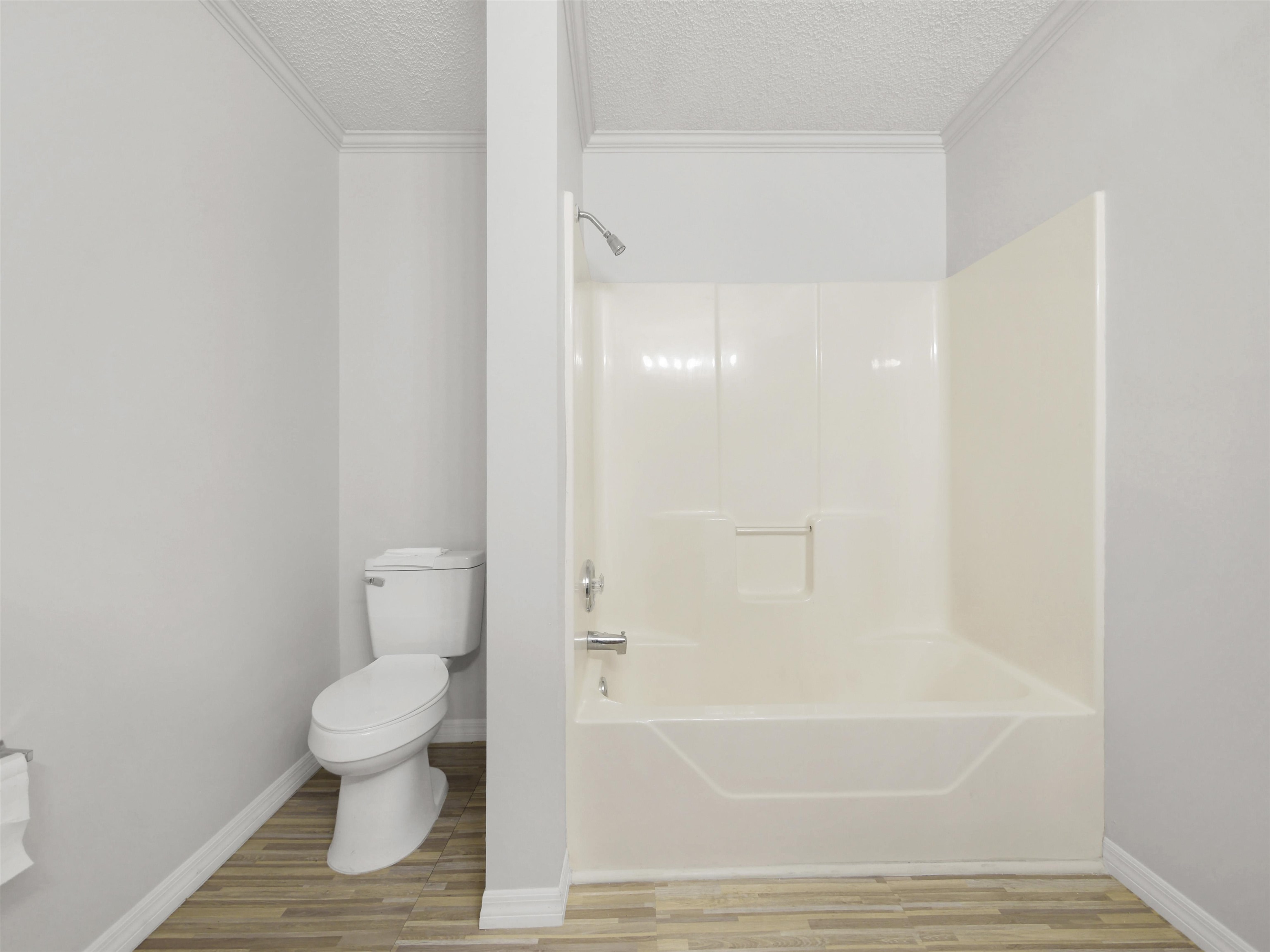 50 Spring Street St. Augustine, FL 32084 - Photo 15 of 30 a bathroom with a toilet and a shower