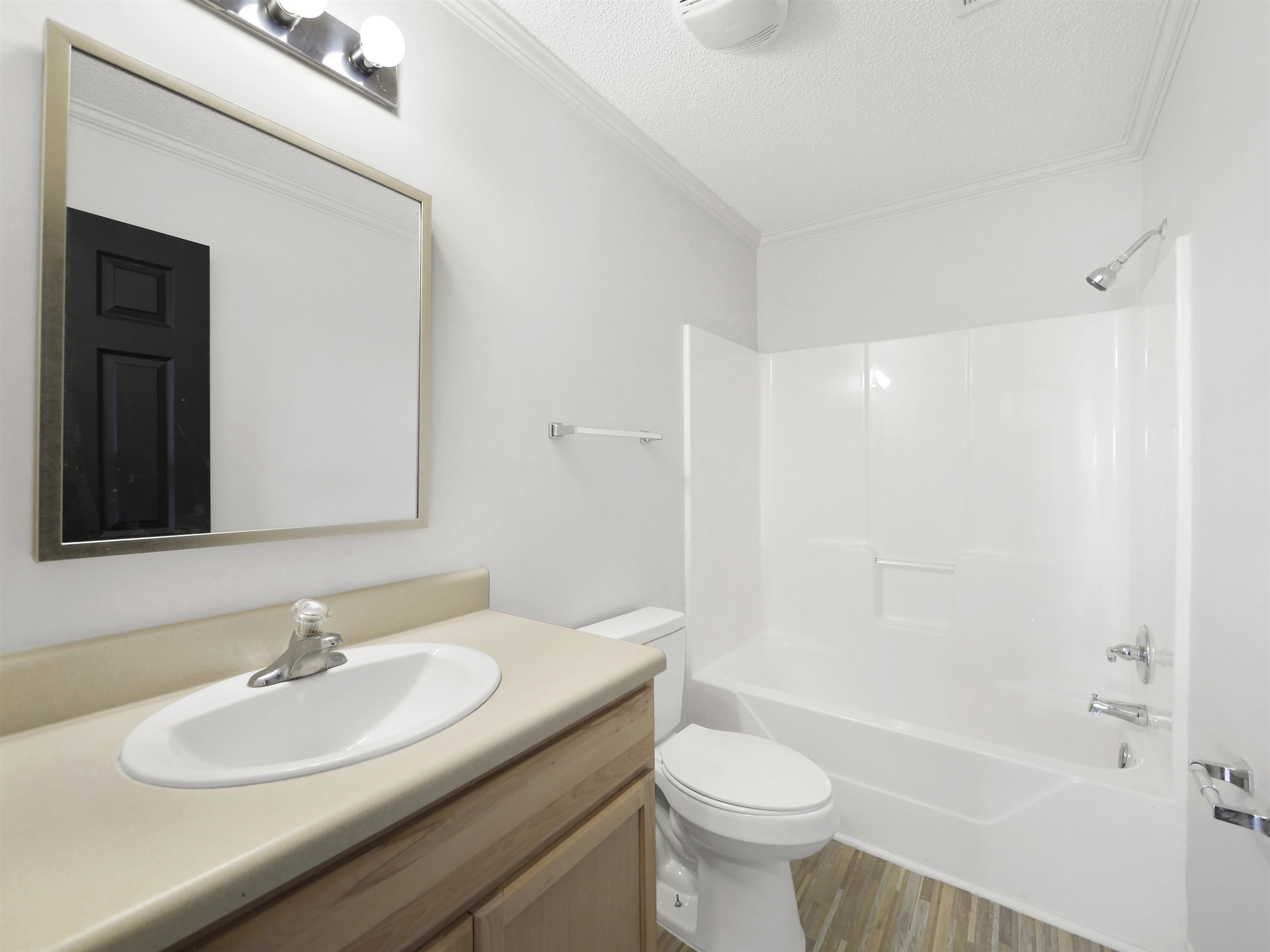 50 Spring Street St. Augustine, FL 32084 - Photo 18 of 30 a bathroom with a sink a toilet and shower