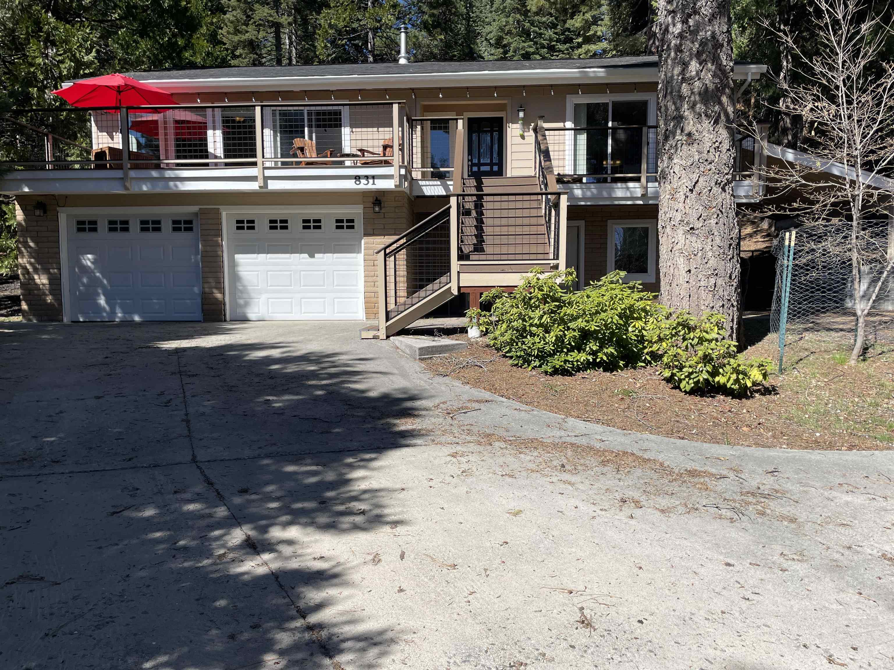 a front view of a house with yard