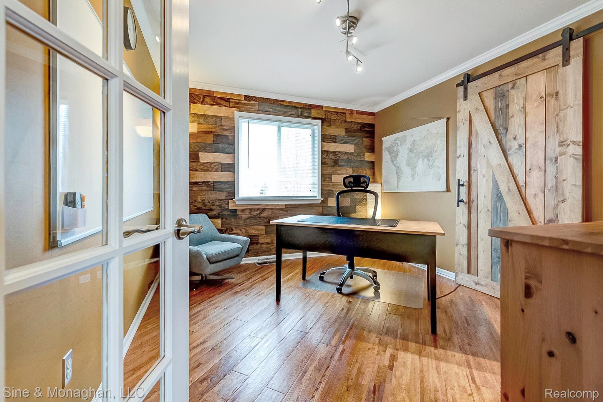 3248 Wren Lane Rochester, MI 48309 - Photo 21 of 65 Sharp details with wood lap wall and sliding barn closet door