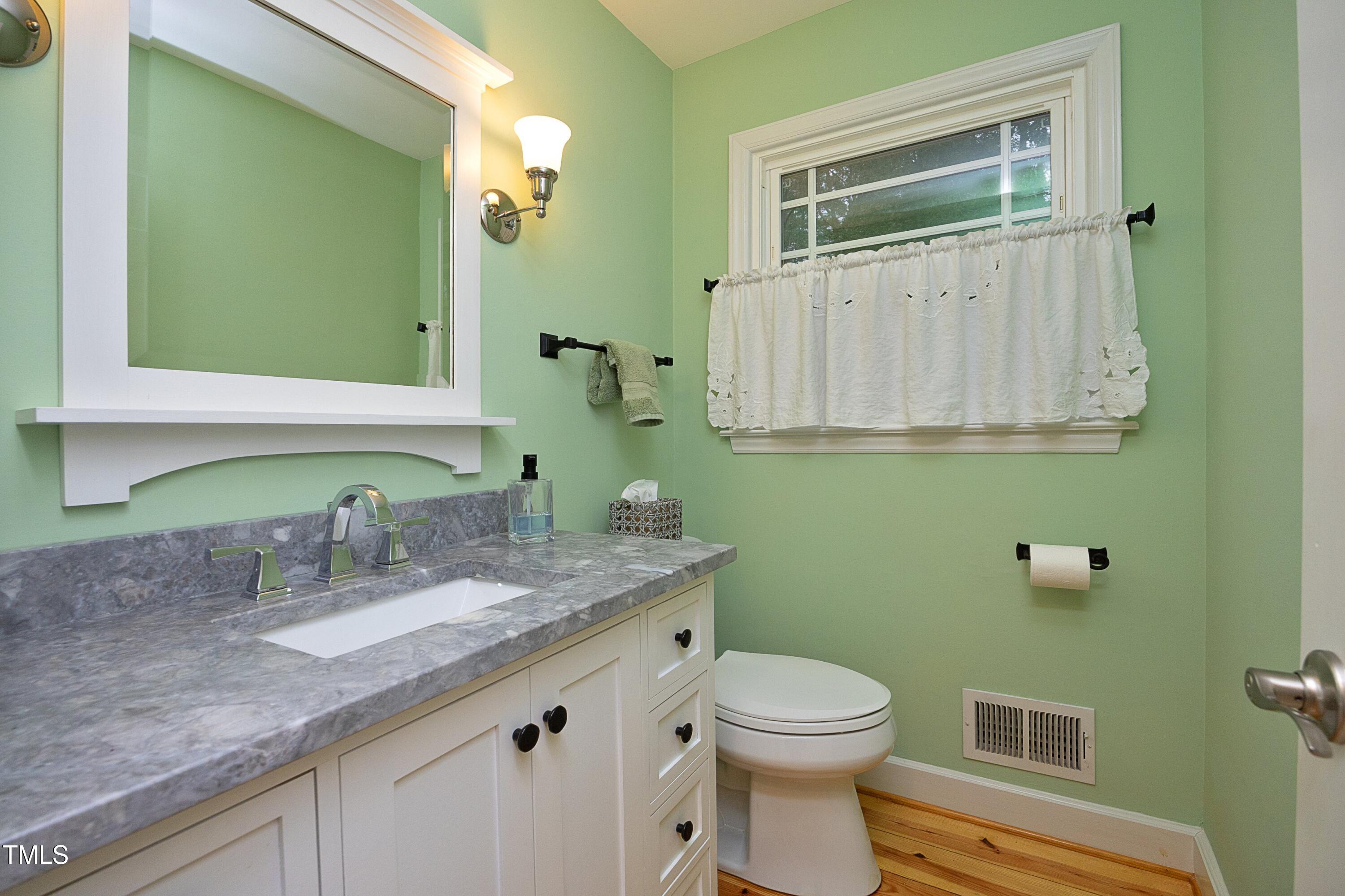 4616 Oak Park Road Raleigh, NC 27612 - Photo 25 of 63 Additional half bath on first floor.