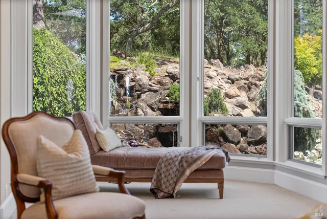 a kitchen with stainless steel appliances granite countertop a stove and a microwave