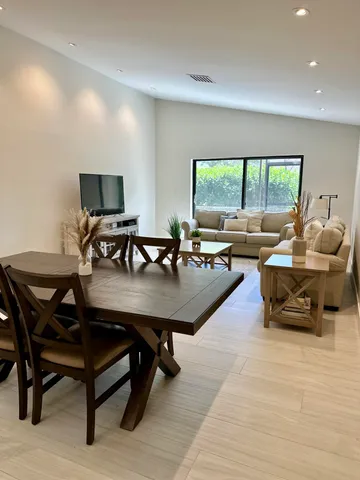 a bathroom with a shower curtain and a sink