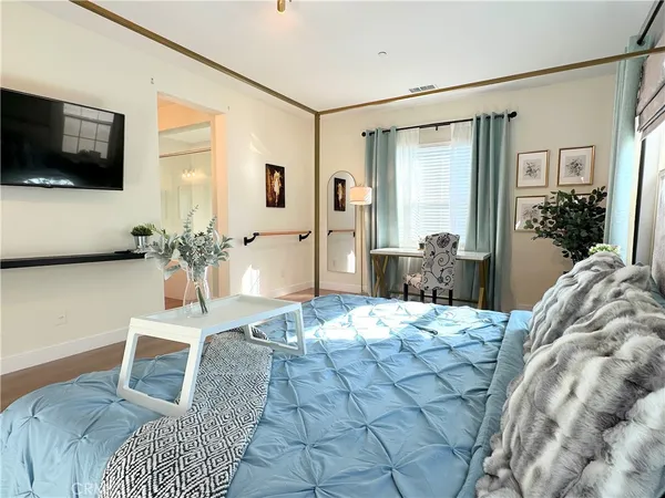 a living room with a couch and a flat screen tv