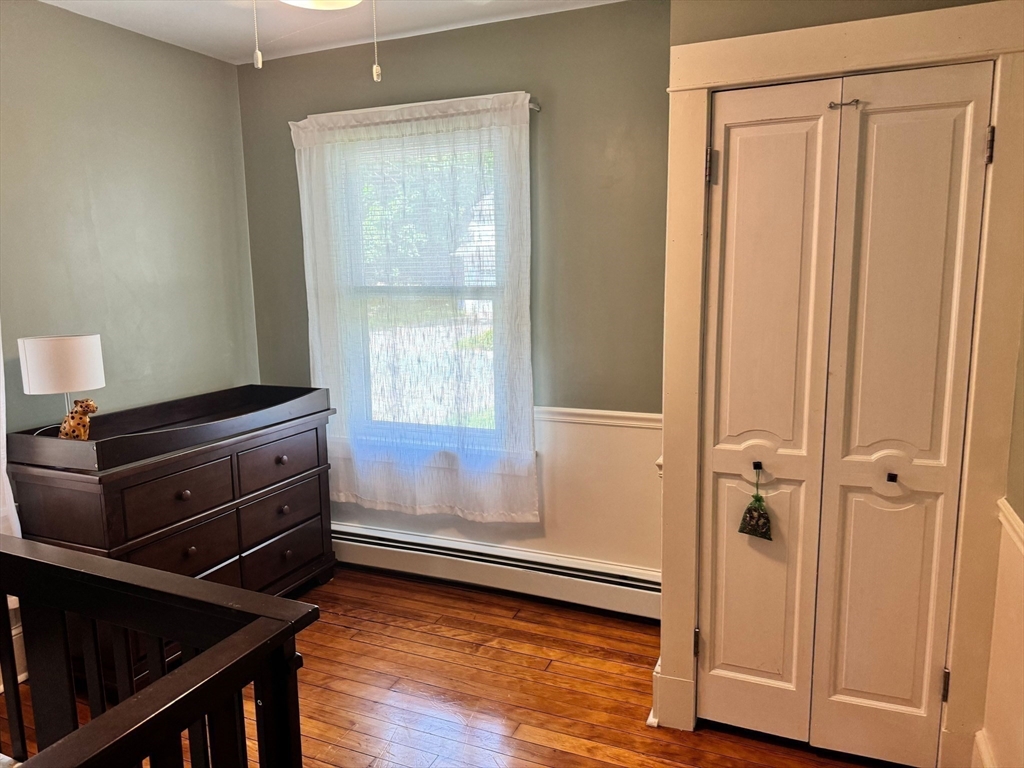 14 Field Street Seekonk, MA 02771 - Photo 13 of 26 a room with a closet and a window