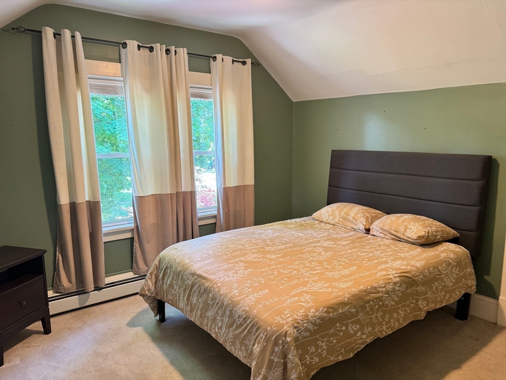 14 Field Street Seekonk, MA 02771 - Photo 17 of 26 a bedroom with a bed and window