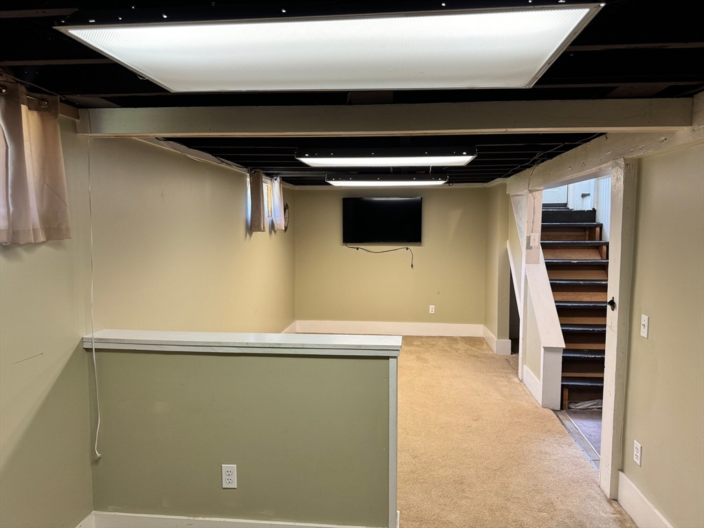 14 Field Street Seekonk, MA 02771 - Photo 23 of 26 a view of a refrigerator in a kitchen