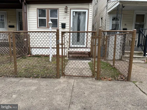 a view of a house with a street