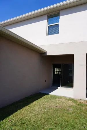 a picture of a house with a yard