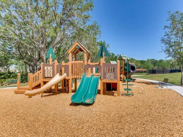 a view of a park with swings