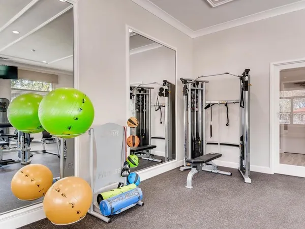 a view of a room with gym equipment