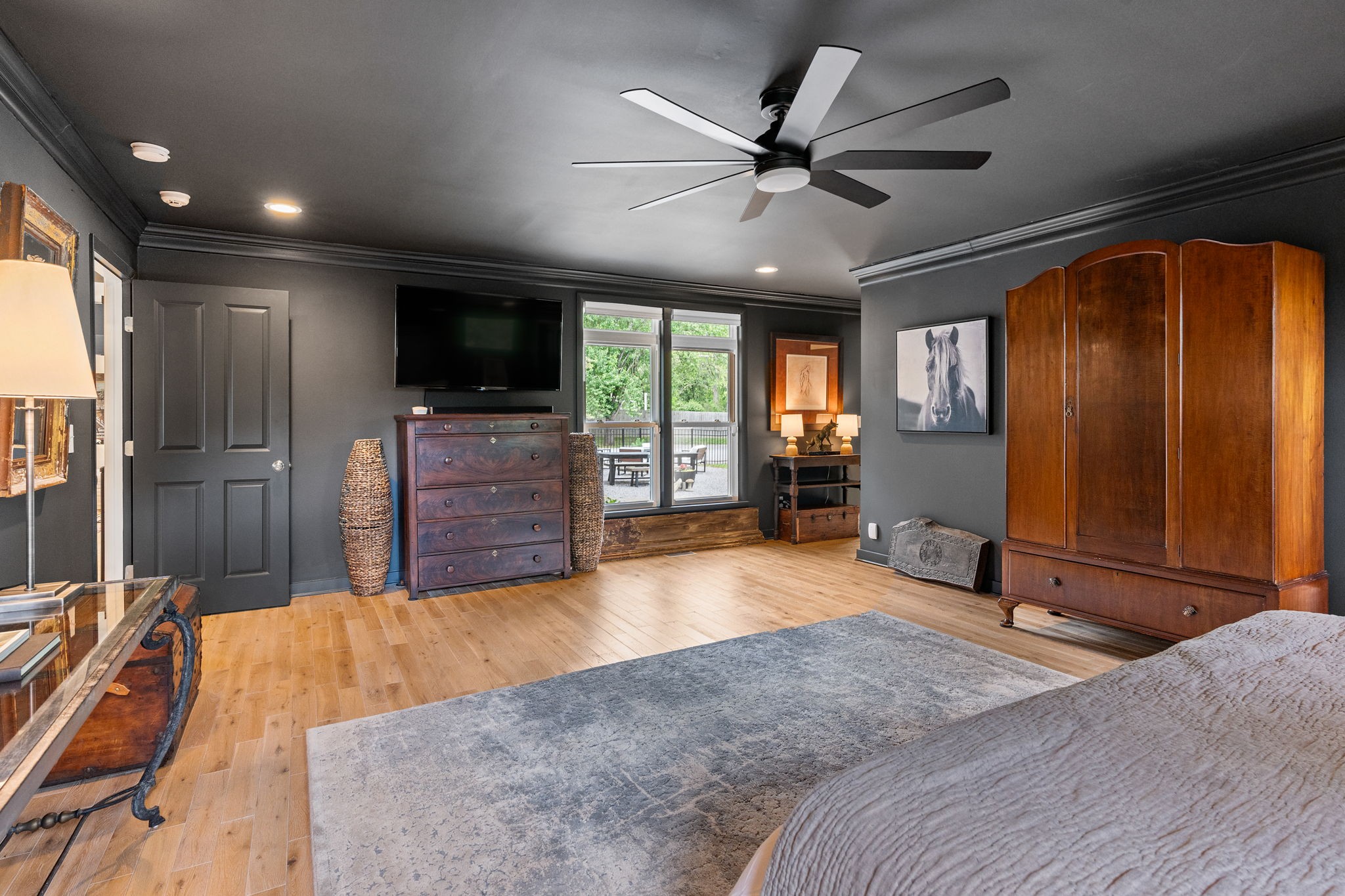 1004 Hickory Hollow Road Nashville, TN 37221 - Photo 19 of 41 a bed room with a bed a television and dresser