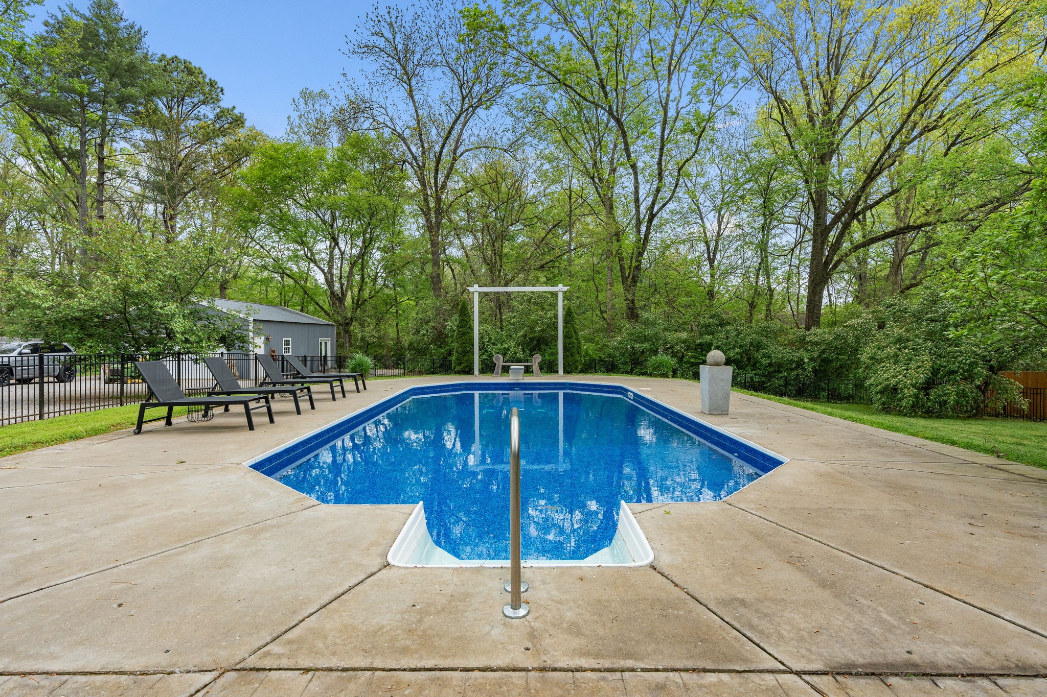 1004 Hickory Hollow Road Nashville, TN 37221 - Photo 30 of 41 a view of a swimming pool with a patio