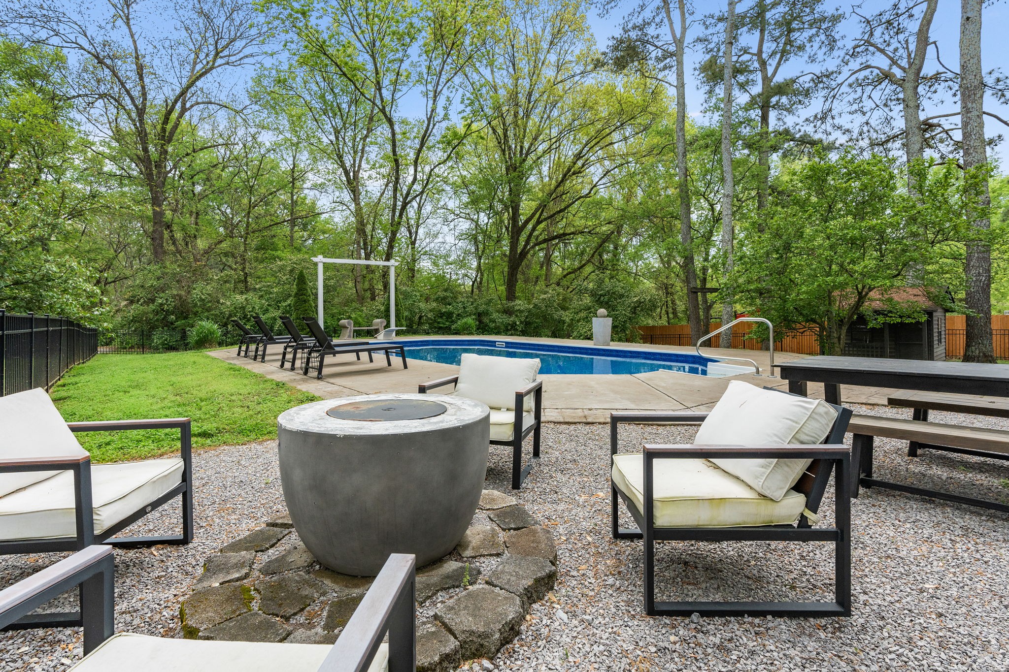 1004 Hickory Hollow Road Nashville, TN 37221 - Photo 31 of 41 a view of a swimming pool with chairs in a patio