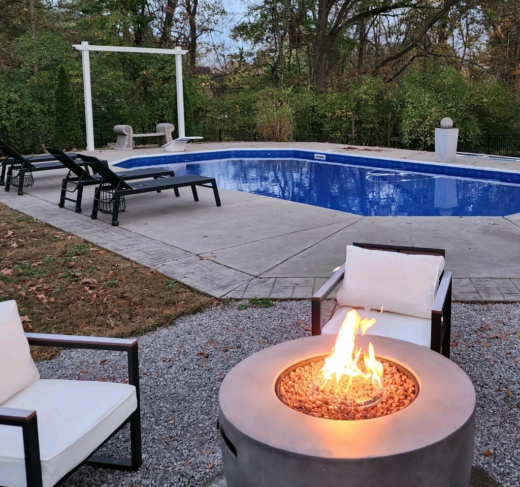 1004 Hickory Hollow Road Nashville, TN 37221 - Photo 32 of 41 a view of a chairs and fire pit in the patio