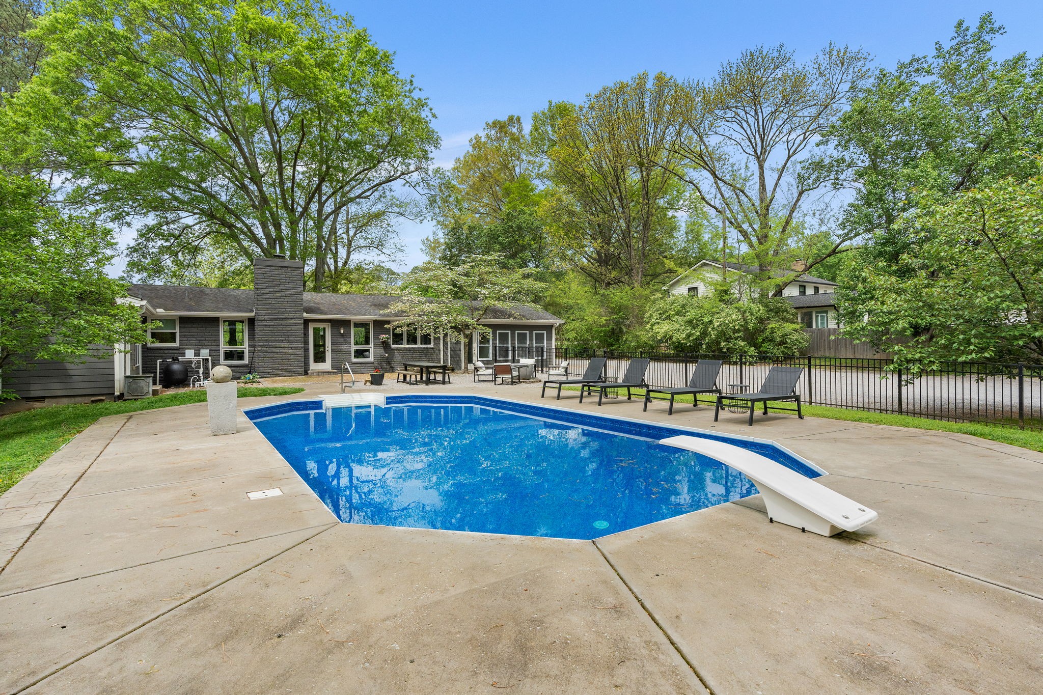 1004 Hickory Hollow Road Nashville, TN 37221 - Photo 33 of 41 a view of a house with swimming pool and a yard