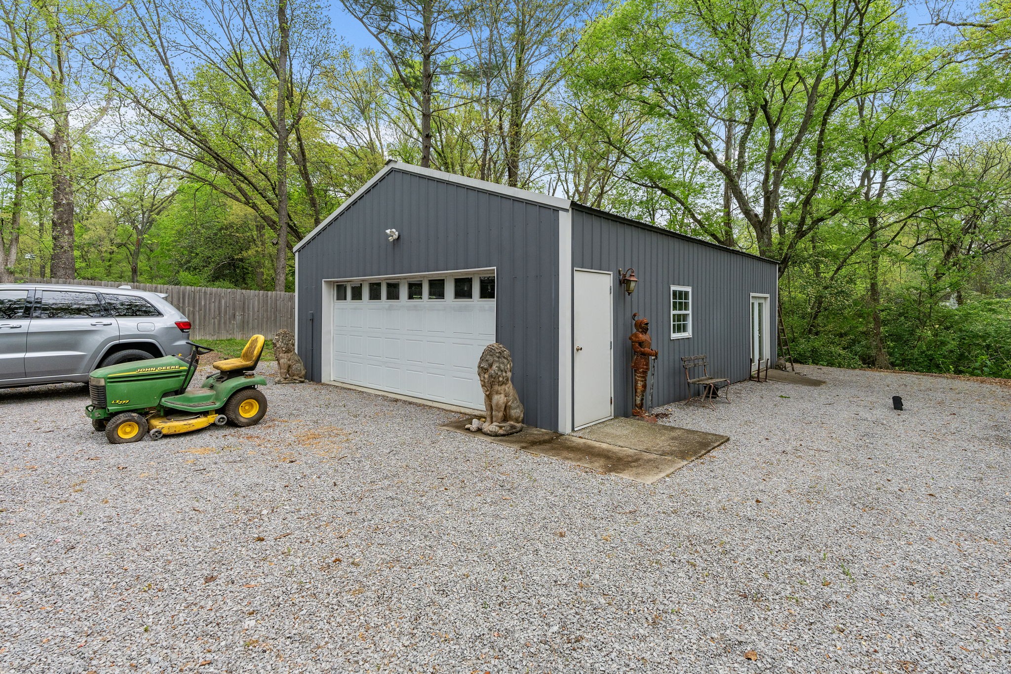 1004 Hickory Hollow Road Nashville, TN 37221 - Photo 40 of 41 a view of a house with a yard and large trees