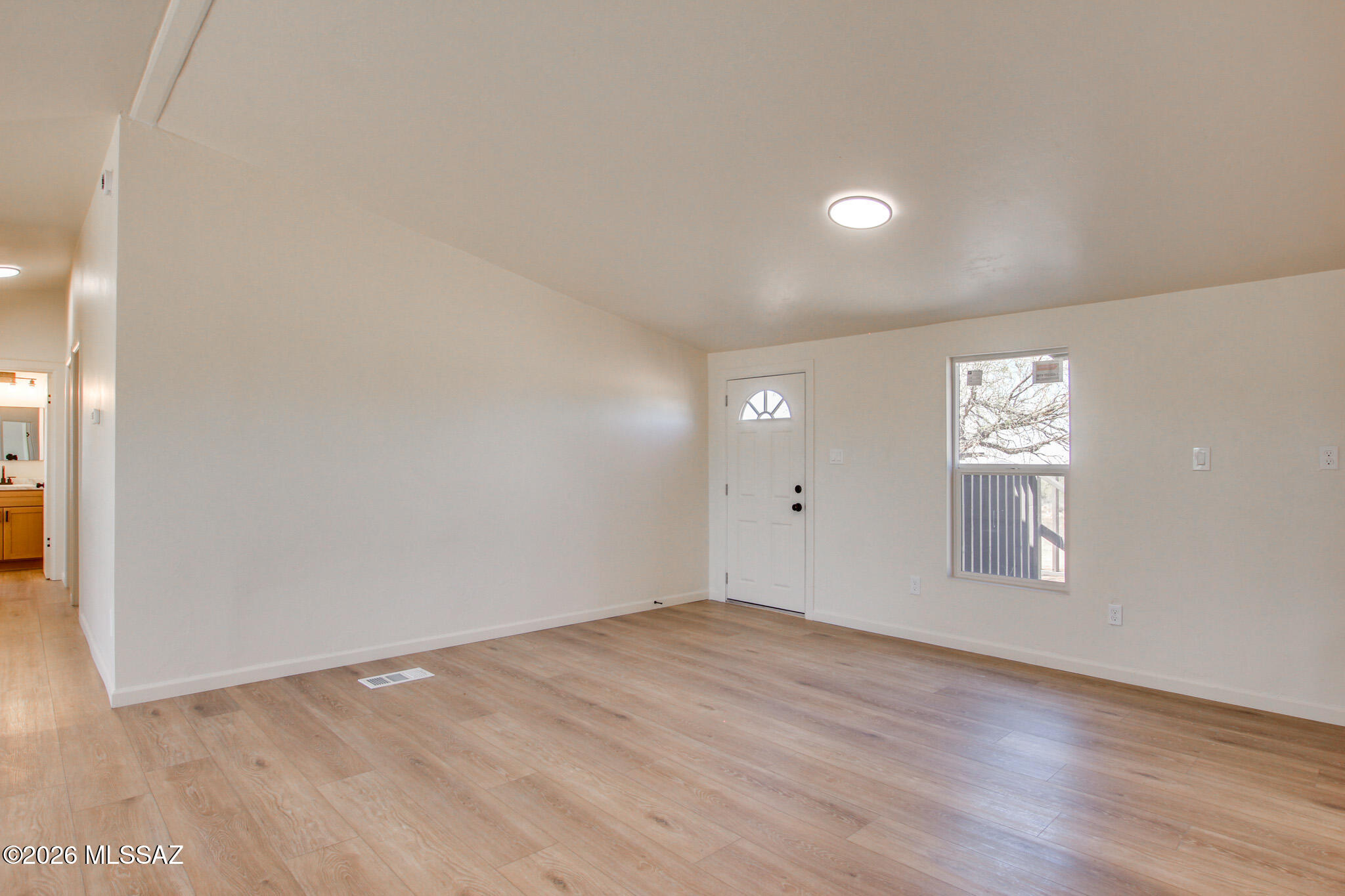 14303 West Rolina Lane Tucson, AZ 85736 - Photo 10 of 38 an empty room with windows and closet