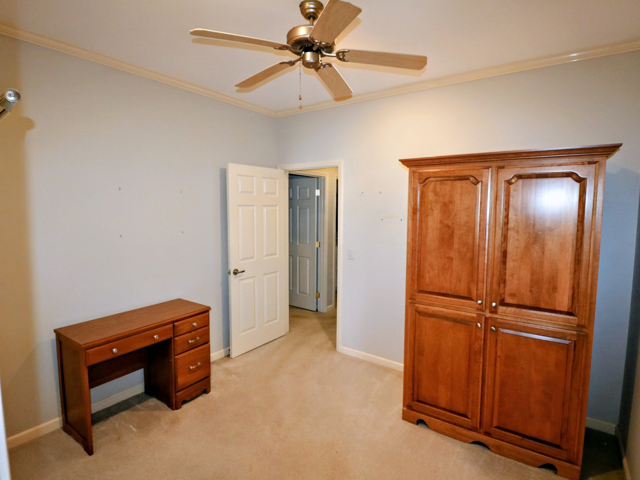19 Emerald Cove, Unit B Paris, TN 38242 - Photo 19 of 24 a room with closet and ceiling fan