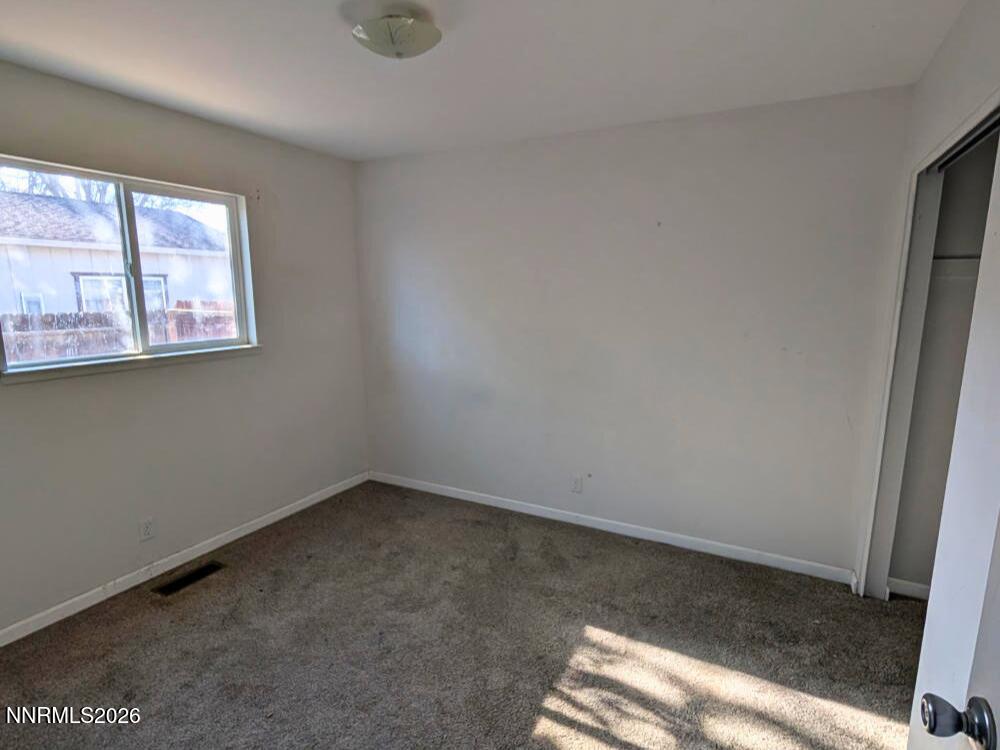 848 C Street Fernley, NV 89408 - Photo 12 of 15 an empty room with windows