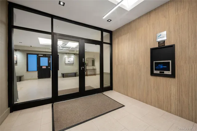a view of a hallway with a large window