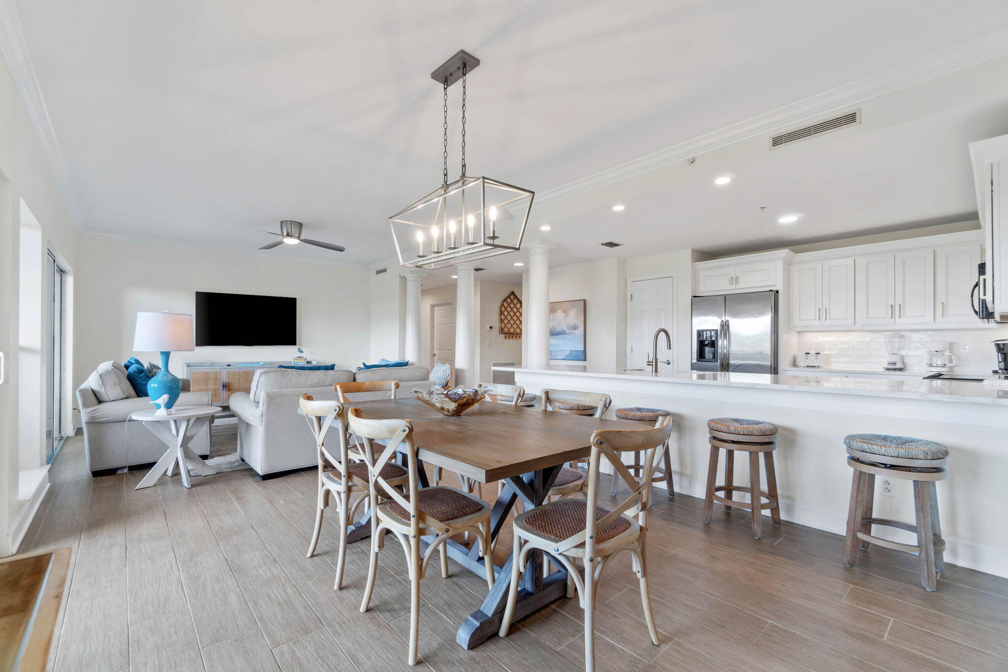 1732 West County Highway 30A, Unit 402 Santa Rosa Beach, FL 32459 - Photo 15 of 32 a view of a dining room with furniture window and wooden floor
