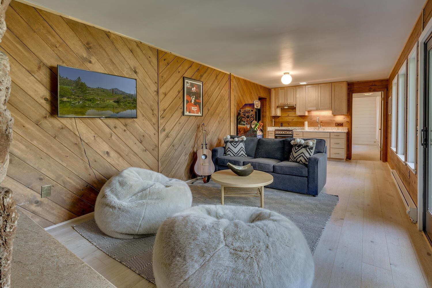 126 Tiger Tail Road Olympic Valley, CA 96146 - Photo 18 of 28 a living room with furniture and a flat screen tv