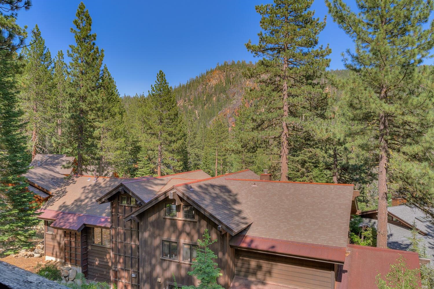 126 Tiger Tail Road Olympic Valley, CA 96146 - Photo 27 of 28 an aerial view of a house with a yard