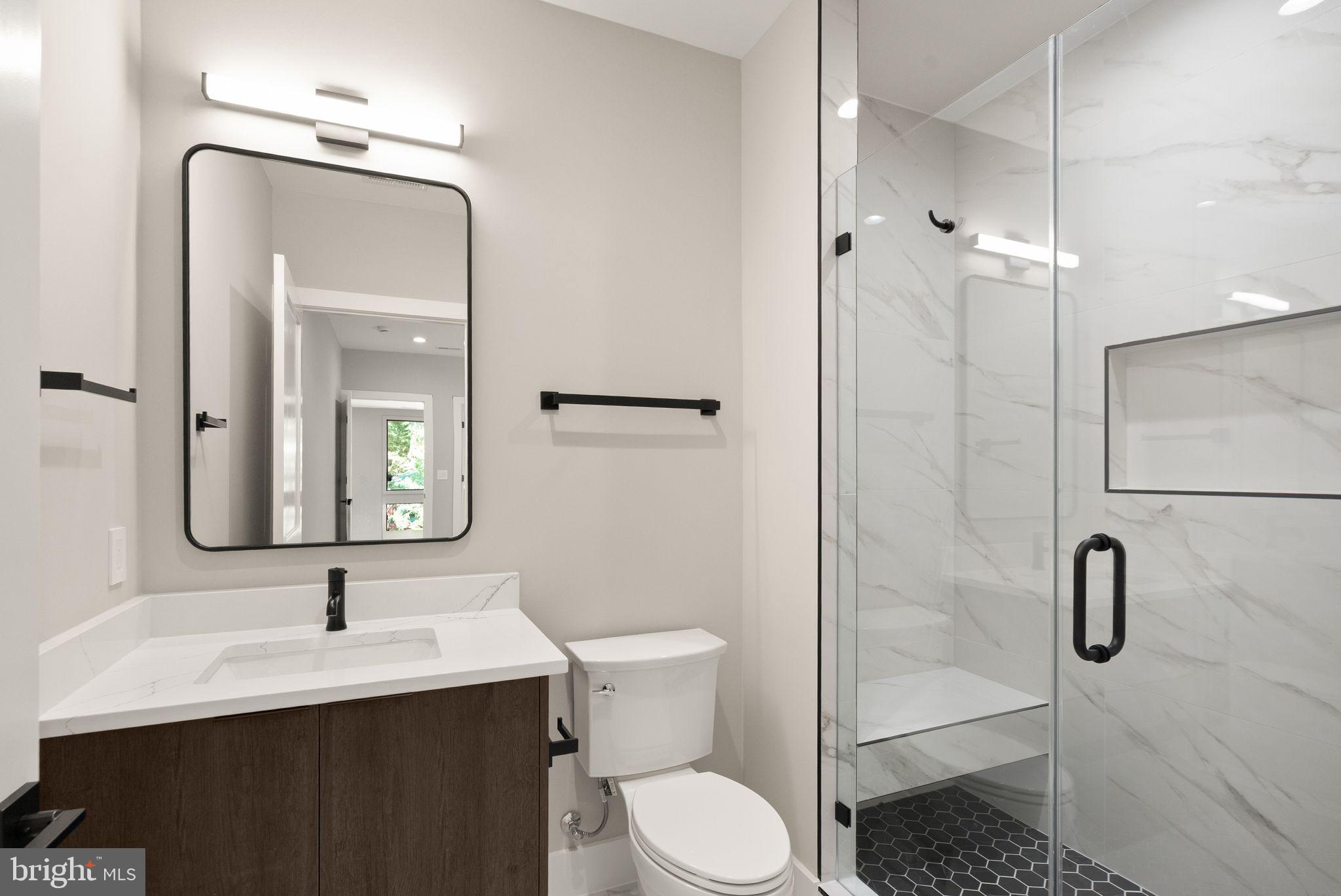6329 Halsey Road McLean, VA 22101 - Photo 62 of 94 Sleek modern bathroom with elegant finishes.