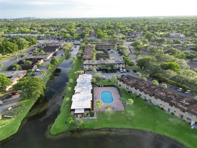 an aerial view of residential house with outdoor space