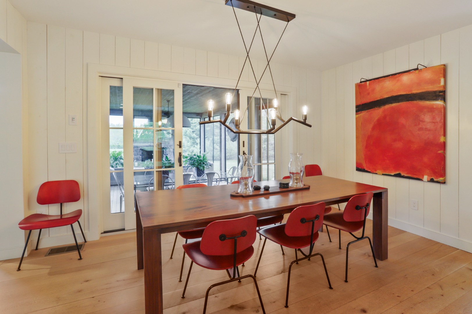 9 Ridge Hill Road Chilmark, MA 02535 - Photo 10 of 48 a view of a dining room with furniture and chandelier