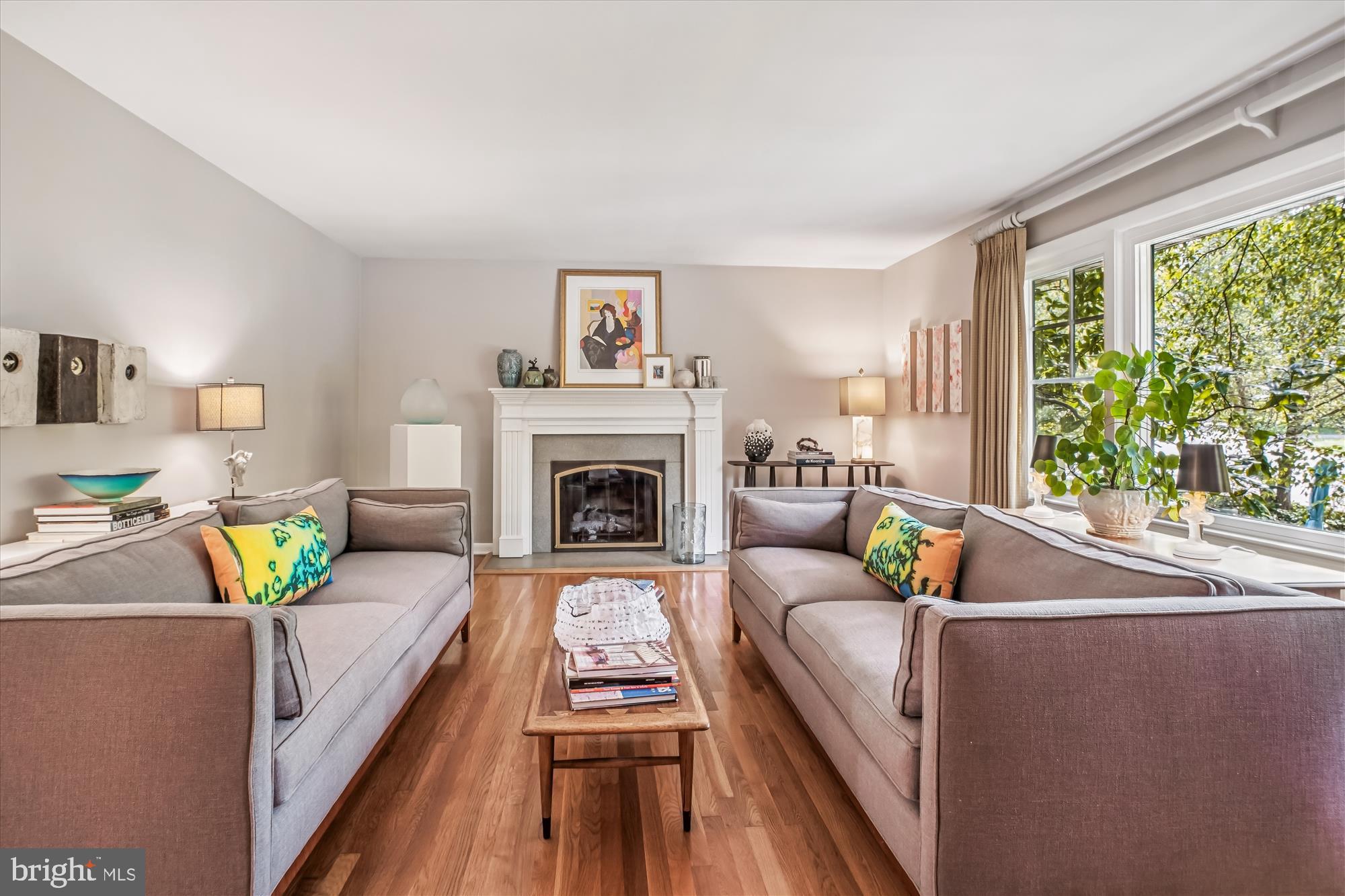 3717 Chanel Road Annandale, VA 22003 - Photo 13 of 57 a living room with furniture and a fireplace