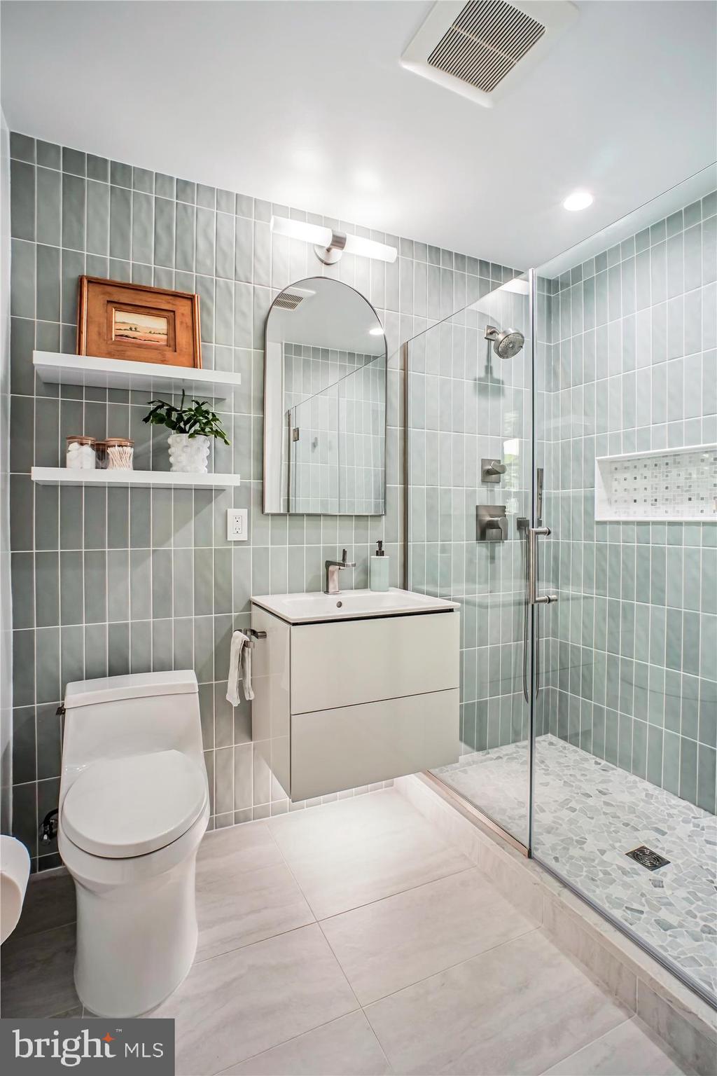 3717 Chanel Road Annandale, VA 22003 - Photo 20 of 57 a bathroom with a sink a toilet and shower