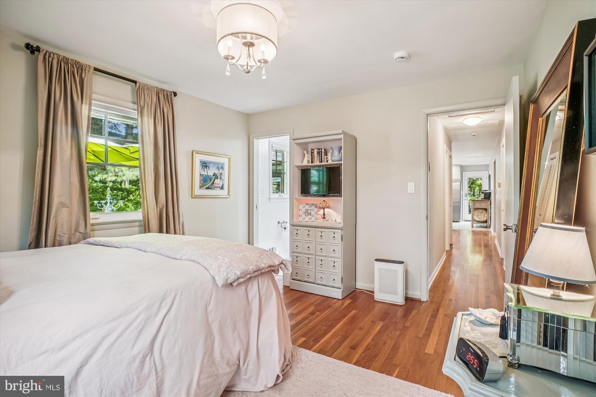 3717 Chanel Road Annandale, VA 22003 - Photo 23 of 57 a spacious bedroom with a bed and a wooden floor