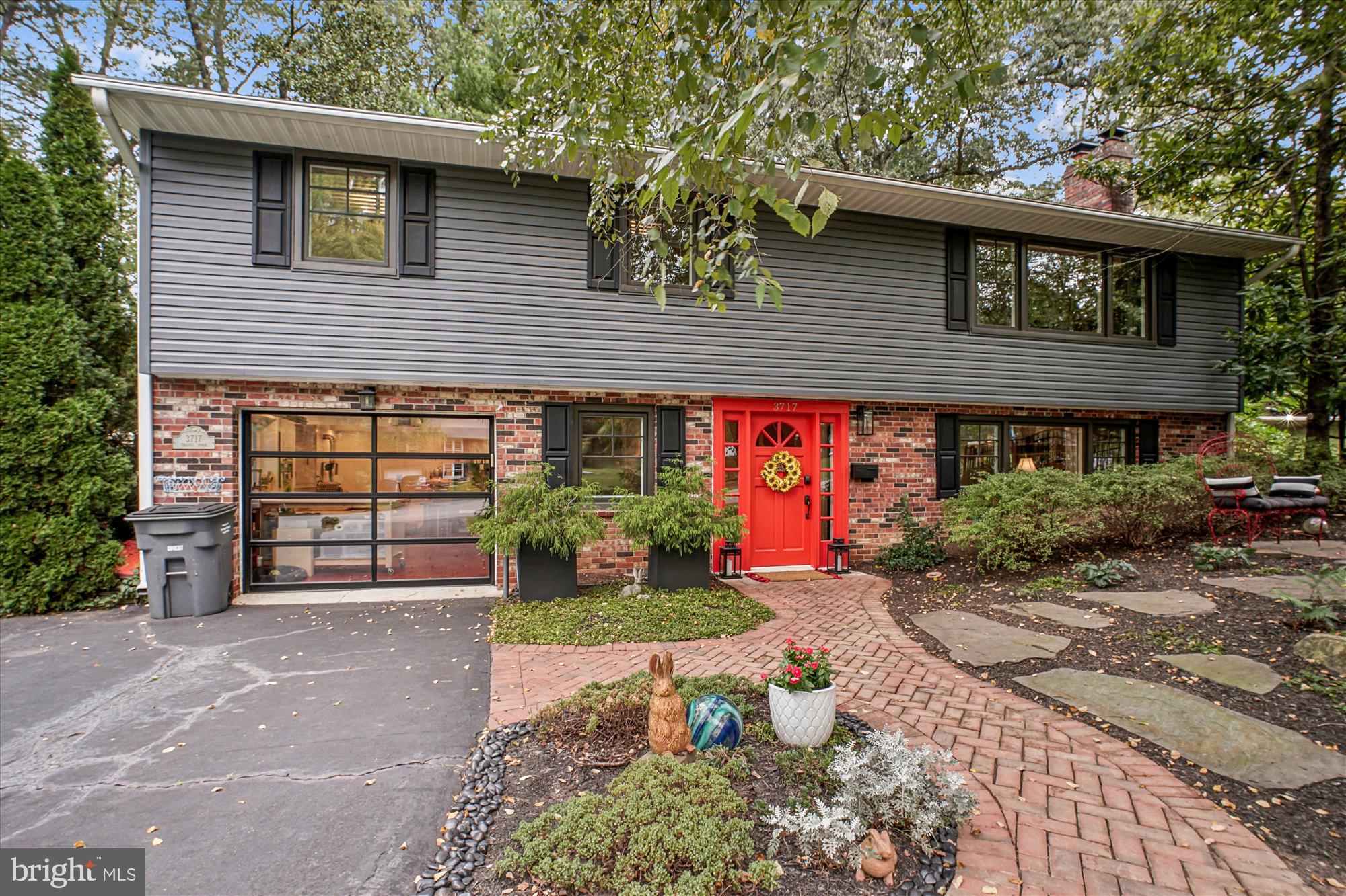 3717 Chanel Road Annandale, VA 22003 - Photo 3 of 57 a front view of a house with garden