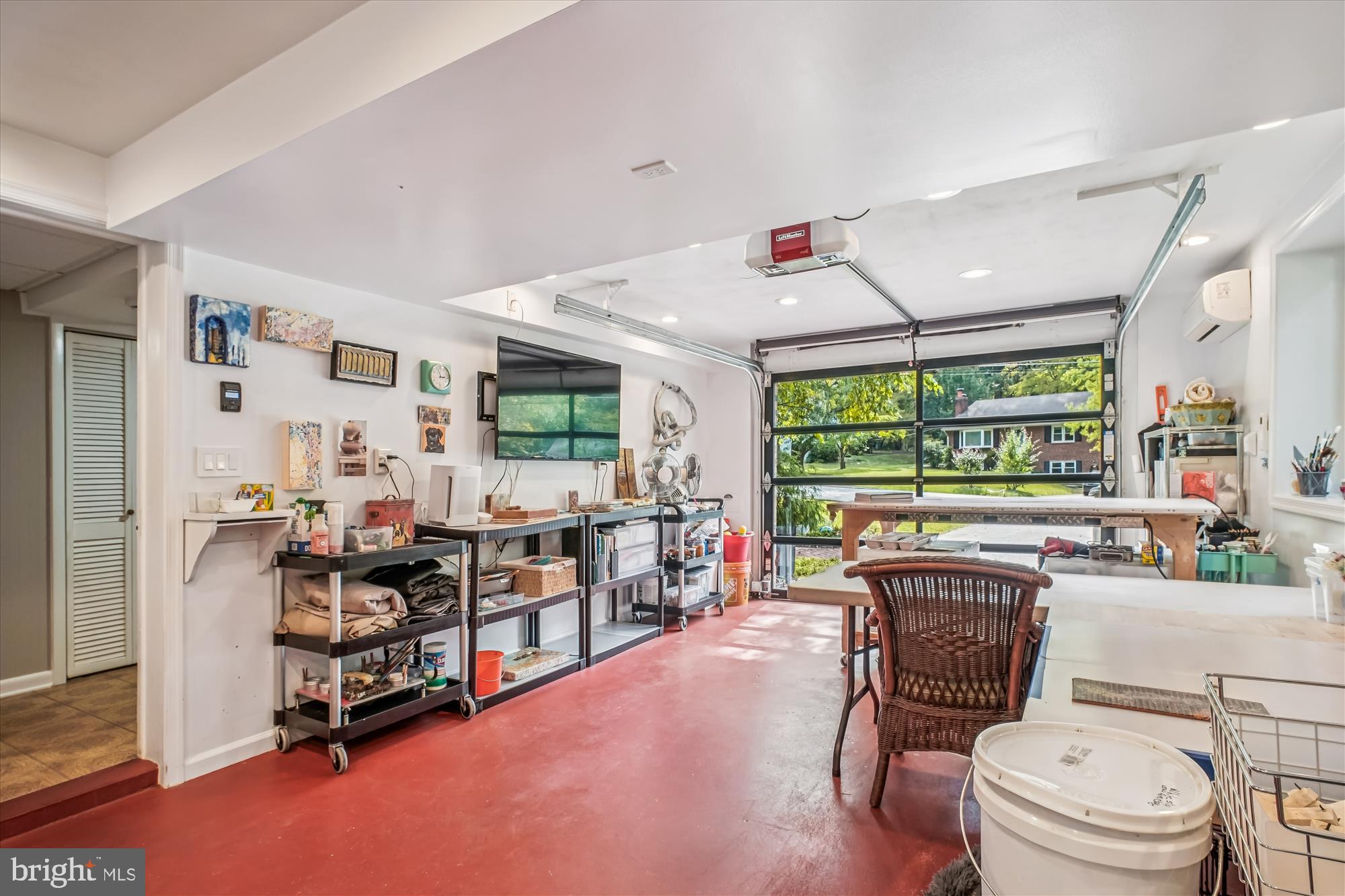 3717 Chanel Road Annandale, VA 22003 - Photo 32 of 57 a living room with furniture a fireplace and a large window