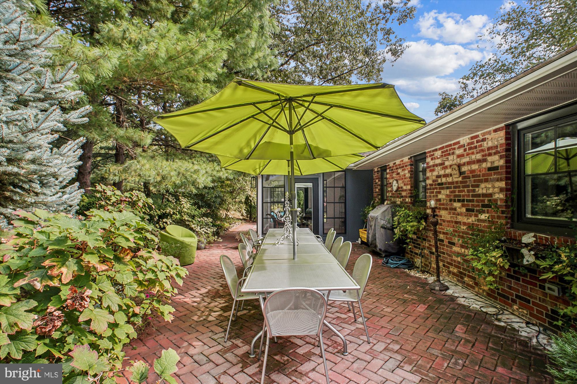 3717 Chanel Road Annandale, VA 22003 - Photo 41 of 57 an outdoor space with furniture and umbrella