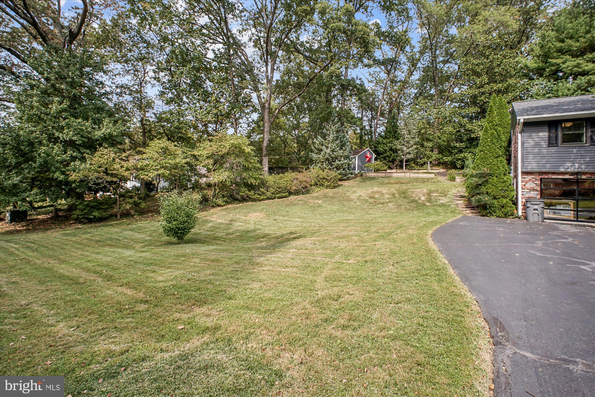 3717 Chanel Road Annandale, VA 22003 - Photo 47 of 57 a view of a yard with an outdoor space