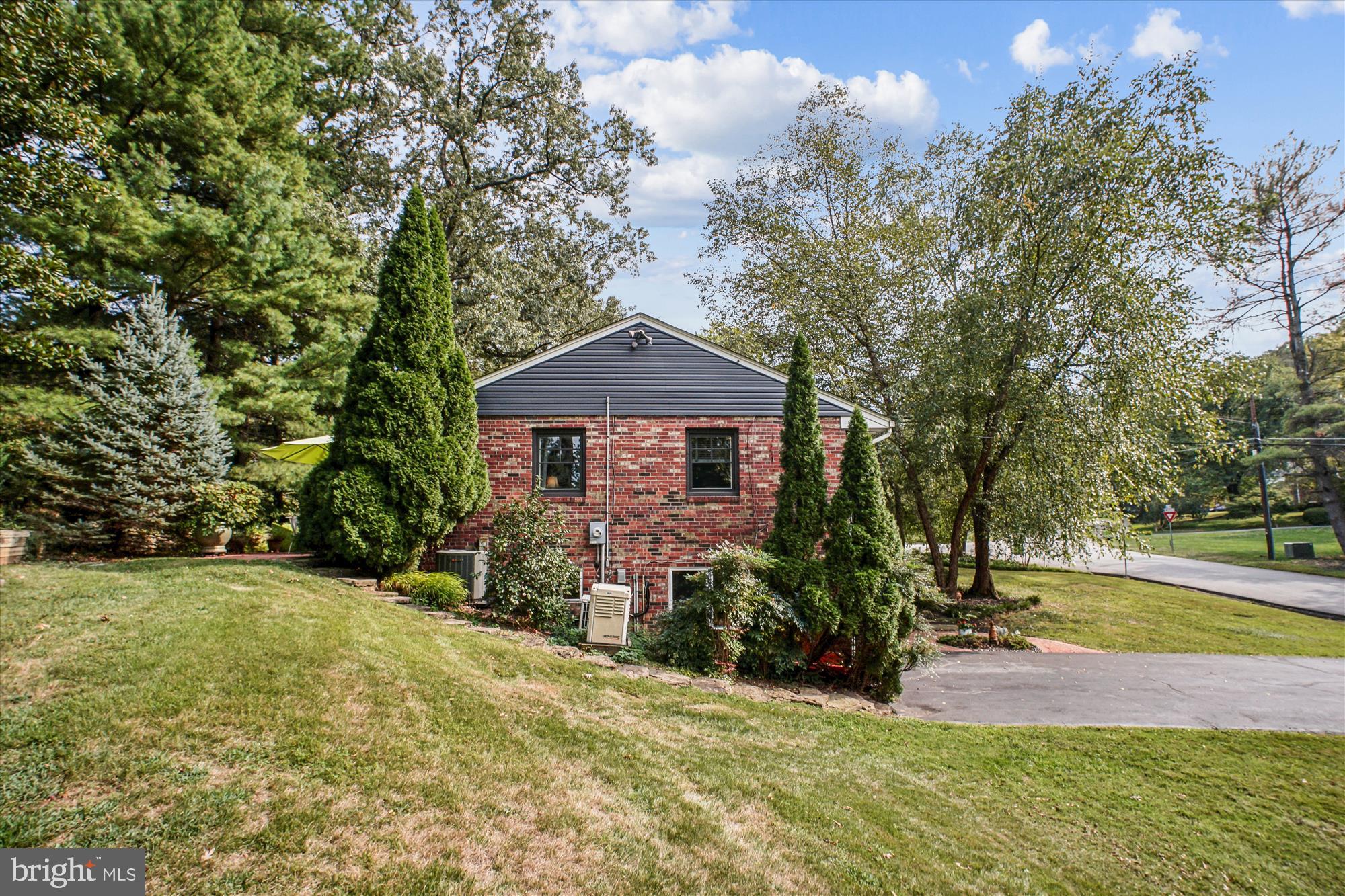 3717 Chanel Road Annandale, VA 22003 - Photo 52 of 57 a front view of a house with a yard