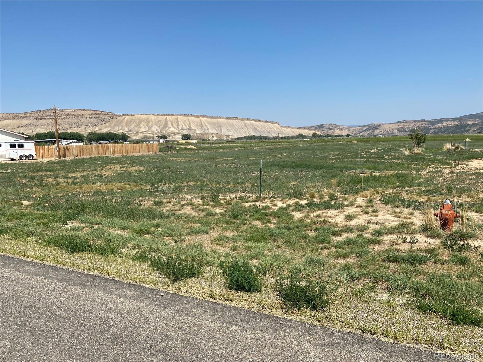 101 County Road Rangely, CO 81648 - Photo 7 of 8 a view of a field with an ocean
