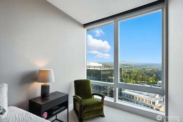 a view of a glass door and a balcony